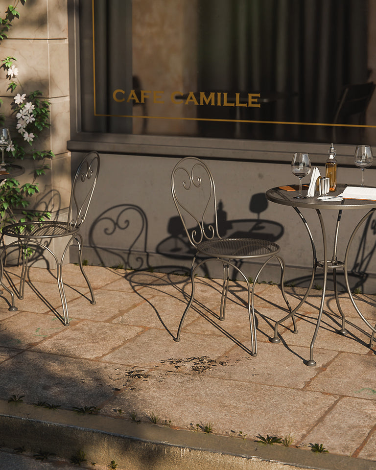 Royal Garden Bistro set of a table and two chairs situated outsides a cafe. 